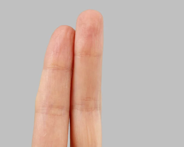 Weiße Hand auf perfektem grauen Hintergrund — Stockfoto