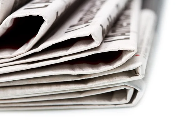 Various newspapers over white background — Stock Photo, Image