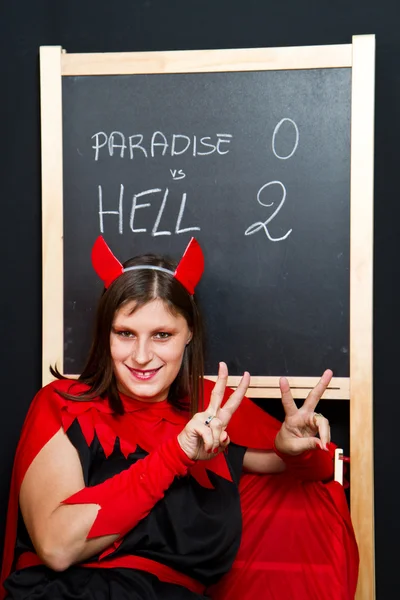 Krásná mladá ďábel žena — Stock fotografie