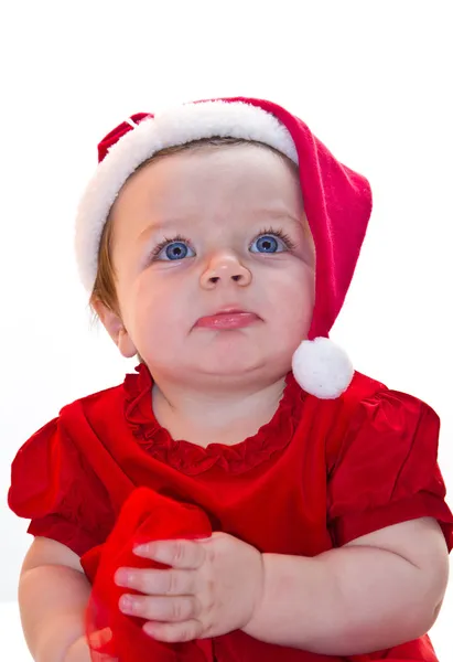 Meisje van de baby kruipen santa claus — Stockfoto