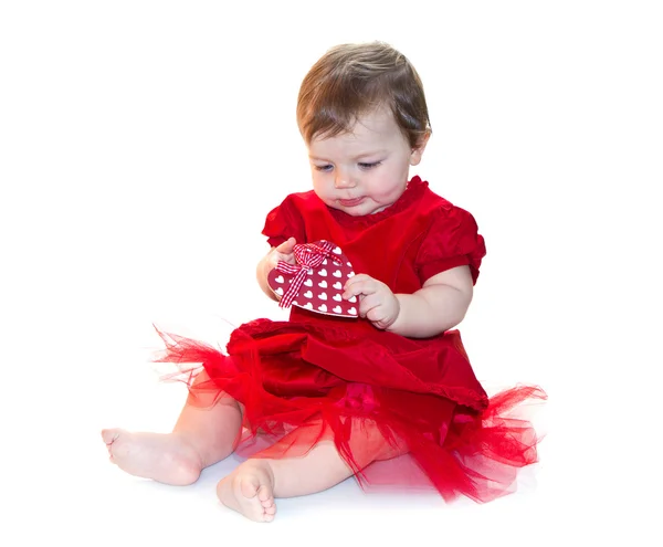 Portret van babymeisje in rood — Stockfoto
