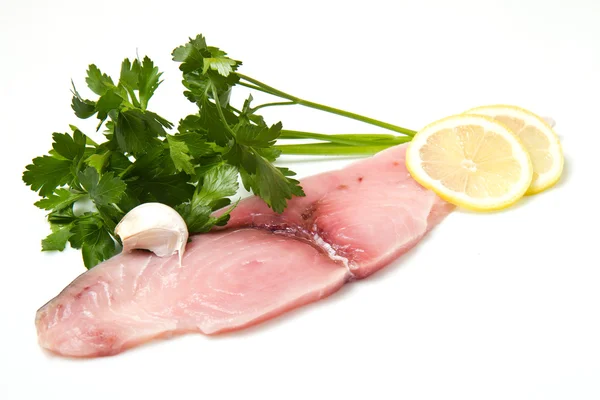 Swordfish with lemon and parsley on white — Stock Photo, Image