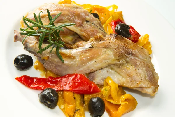 Baked rabbit with olives and pepper — Stock Photo, Image