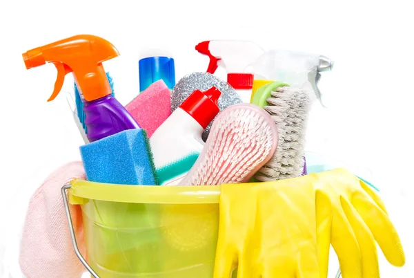 Full box of cleaning supplies and gloves isolated on white — Stock Photo, Image