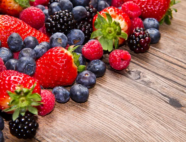 Berries on Wooden Background — Stock Photo, Image