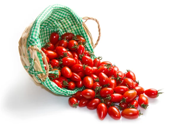 Fresh tomatoes in basket on a white background — Stock Photo, Image