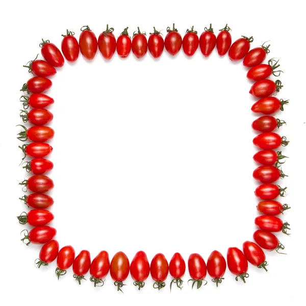 Rahmen aus roten Tomaten isoliert auf weißem Hintergrund — Stockfoto