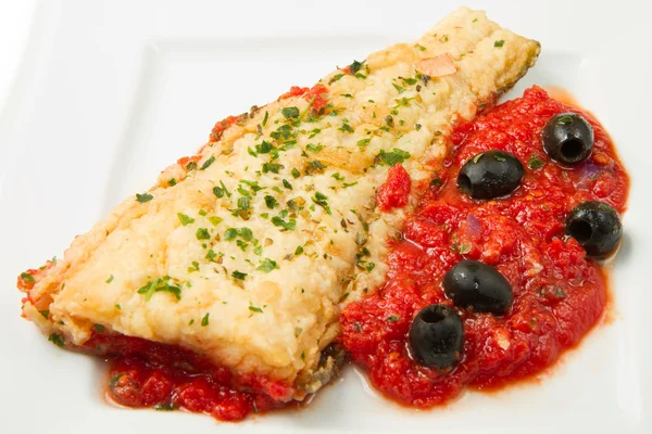 Cooked cod loins with home made tomato sauce — Stock Photo, Image