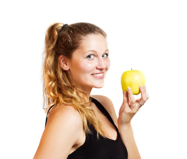 Giovane donna con una mela — Foto Stock