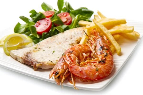Swordfish and grilled prawns with potatoes — Stock Photo, Image