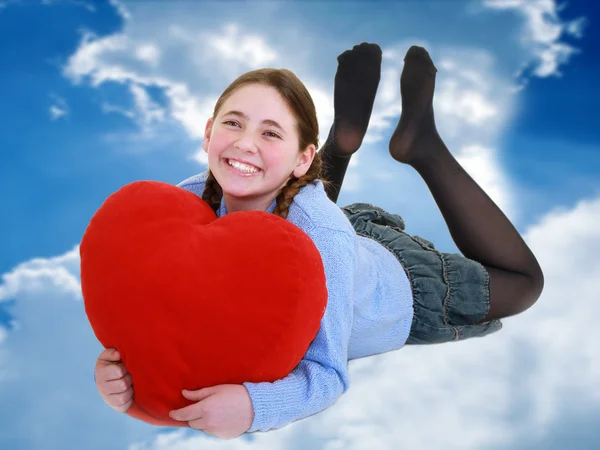 Ung tonåring med rött hjärta — Stockfoto
