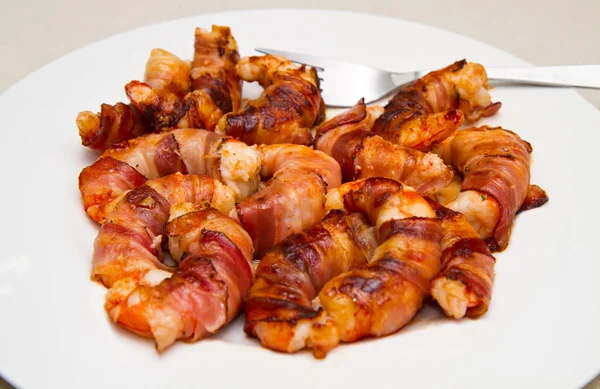 Shrimp with bacon — Stock Photo, Image