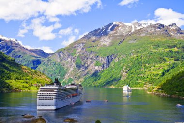 Cruise ship in Norwegian fjords clipart