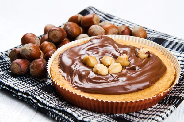 Tartlette met chocolade en hazelnoot room — Stockfoto