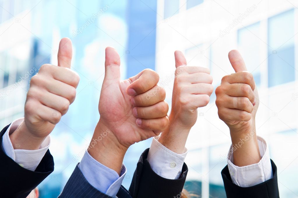Business People with Thumbs Up
