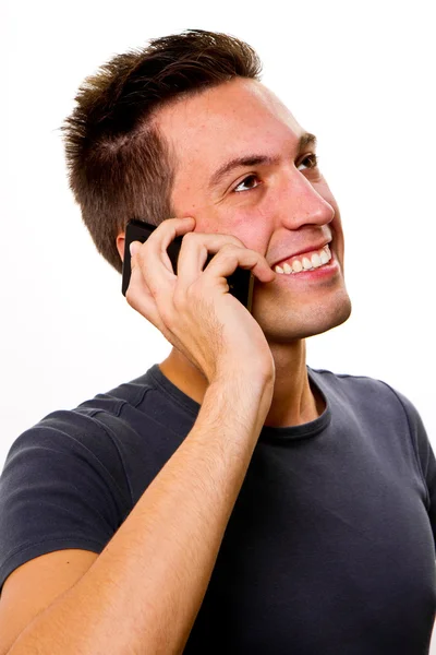Mladý pohledný muž na telefonu — Stock fotografie