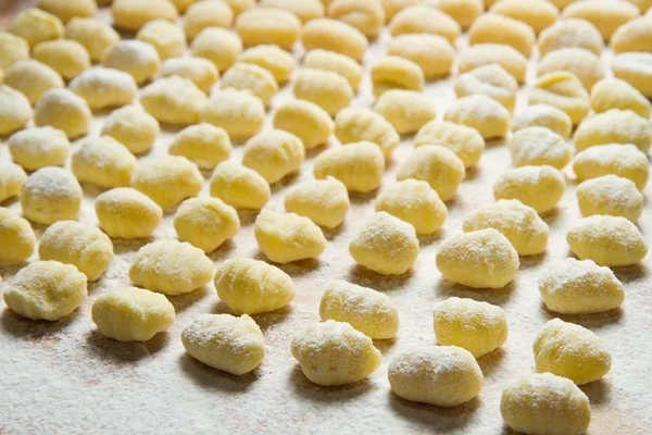 Fresh homemade potato gnocchi ready for cooking — Stock Photo, Image
