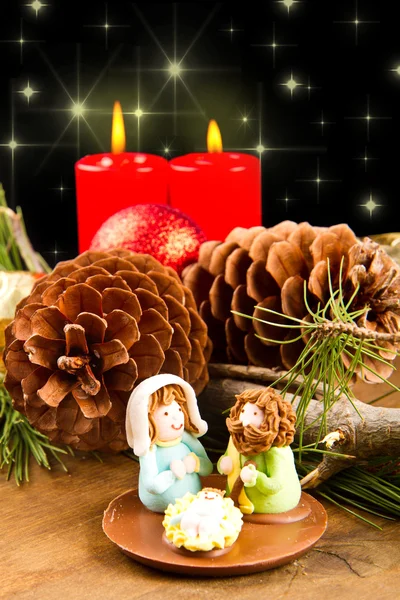 Vánoční svíčka s šiška — Stock fotografie