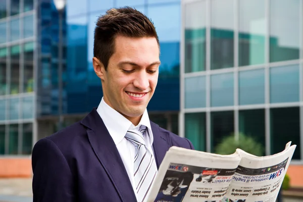 Business man reading a newspaper — Stock Photo, Image