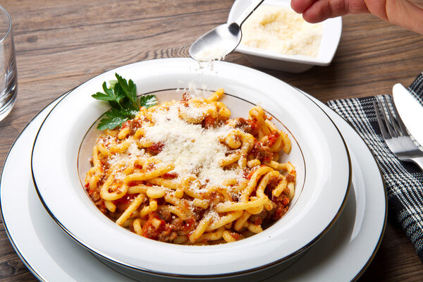 pasta with bolognaise sauce and herbs