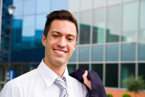 A handsome young business man at office building — Stock Photo, Image