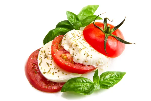 Mozzarella tomates basilic sur fond blanc — Photo