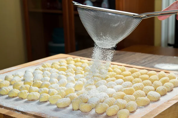 Fresh homemade potato gnocchi ready for cooking — Stock Photo, Image