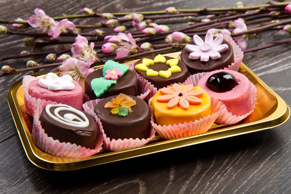 Variety of cassate sicily dessert with spring flower on wood — Stock Photo, Image