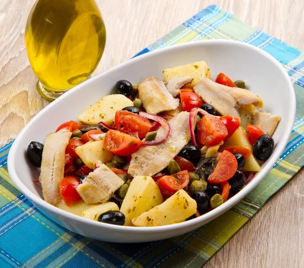 Mackerels with potatoes,tomatoes,capers and olives — Stock Photo, Image