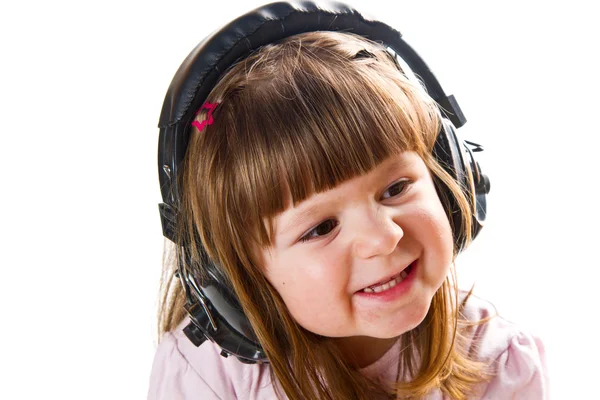 Hermosa linda niña feliz con auriculares — Foto de Stock