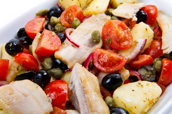 Mackerels with potatoes,tomatoes,capers and olives — Stock Photo, Image