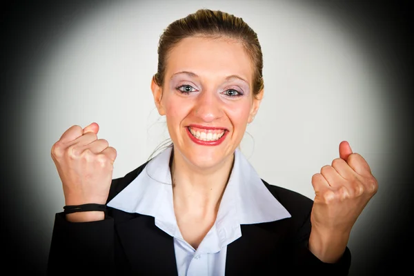 Successful businesswoman with arms up — Stock Photo, Image