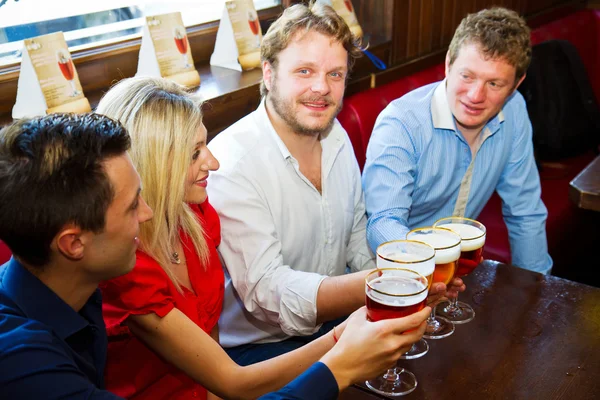 People toasting with a delicious Pale Ale Beer — Stock Photo, Image