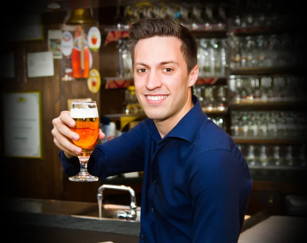 Men drinking beer at the pub — Stock Photo, Image