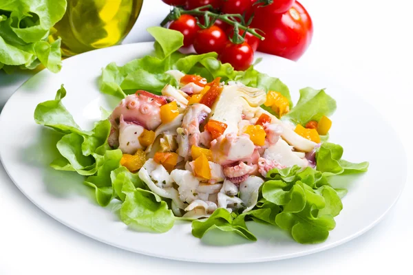 Octopus salad with artichoke — Stock Photo, Image