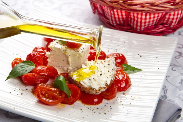Cream cheese with red fresh tomatoes — Stock Photo, Image