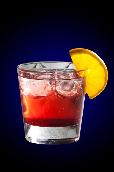 Cocktail with grenadine juice and lemon — Stock Photo, Image