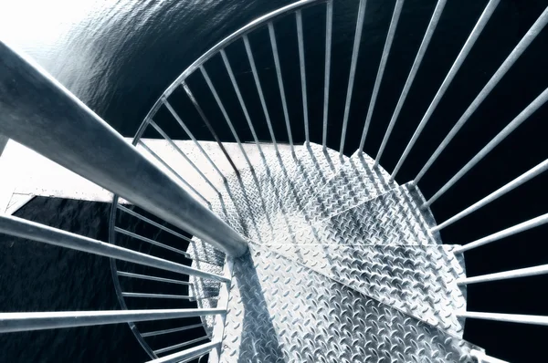 Looking down a metal spiral staircase Looking down a metal spiral staircase — Stock Photo, Image