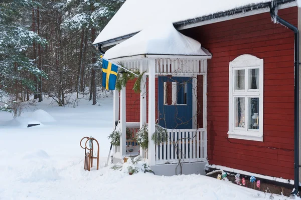 Red painted wooden house in Sweden — Stock Photo, Image