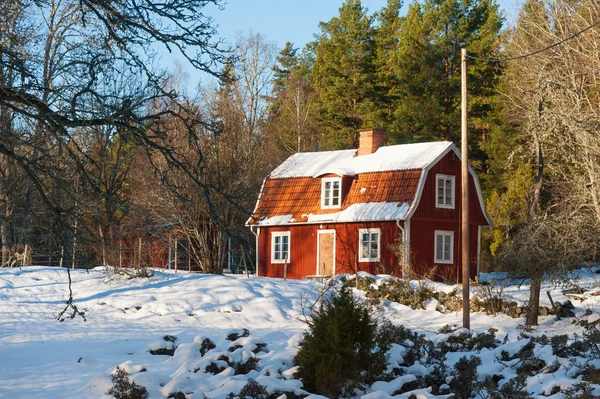 Red painted wooden house in Sweden — Stock Photo, Image