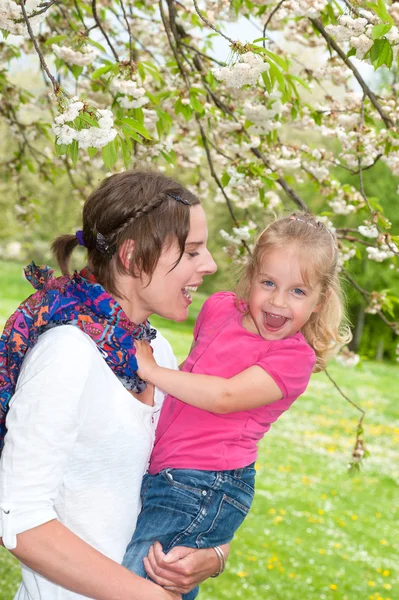 Mother and Daughter enjoying a funny moment while taking a walk — Stock Photo, Image