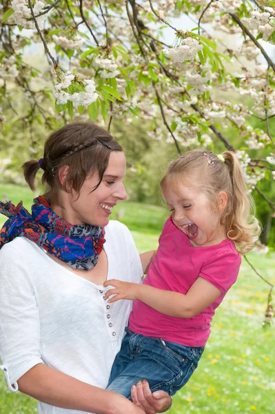 Mother and Daughter enjoying a funny moment while taking a walk — Stock Photo, Image