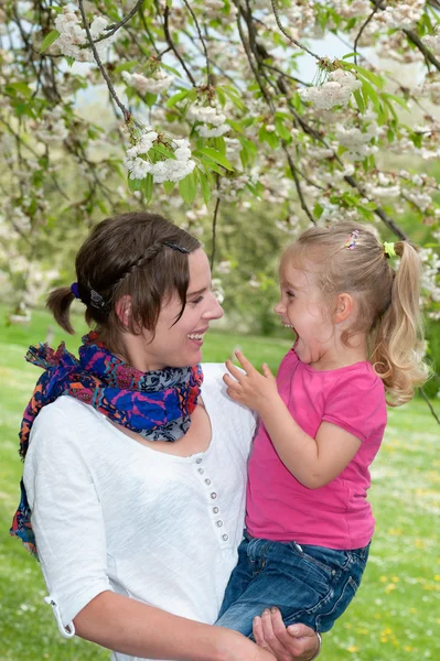 Mother and Daughter enjoying a funny moment while taking a walk — Stock Photo, Image