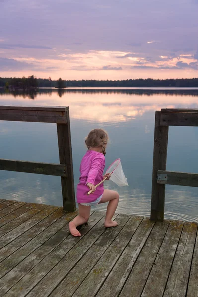 Cute little girl fishing — Stock Photo, Image