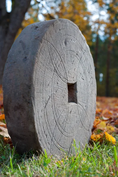 Old handmaking grindstone — Stock Photo, Image