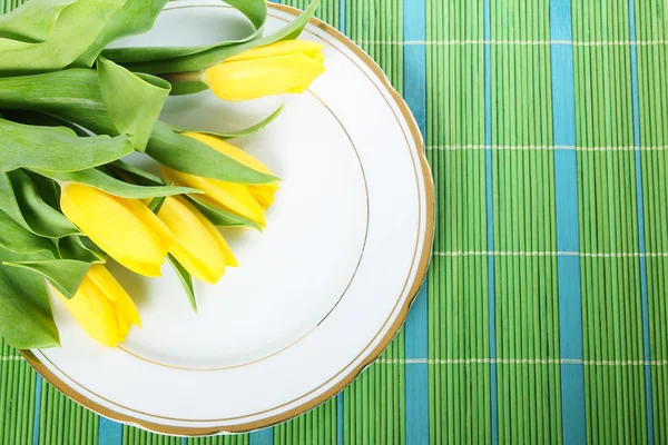 Tulips on plate — Stock Photo, Image