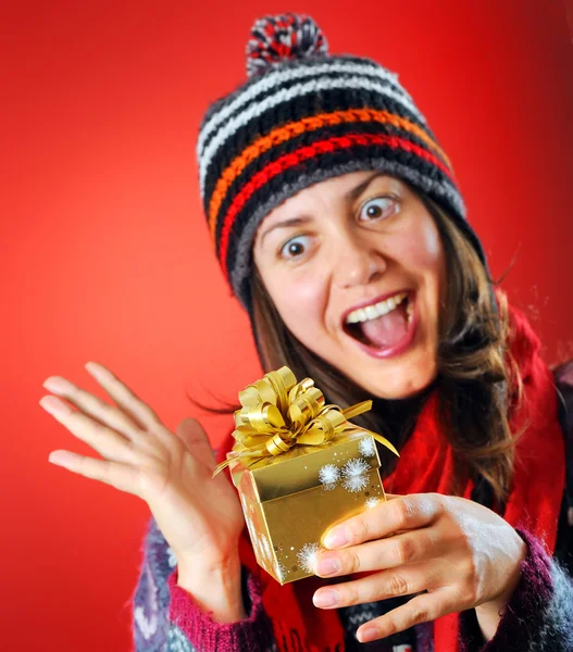 Happy woman with a gift — Stock Photo, Image