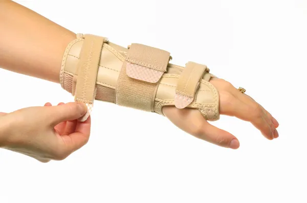 Ręka z Ortezy stawu nadgarstkowego — Zdjęcie stockowe