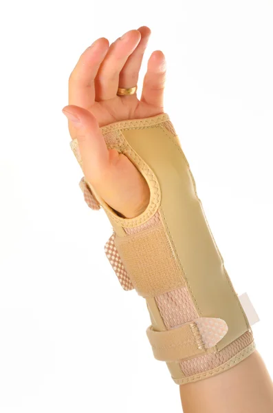 Hand with a wrist brace — Stock Photo, Image