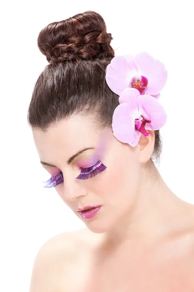 Beautiful Spring makeup with orchid flowers — Stock Photo, Image